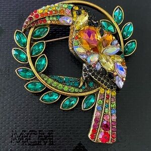 Multi colored toucan bird pin. All stones intact 2 1/4 “ pin. Never worn